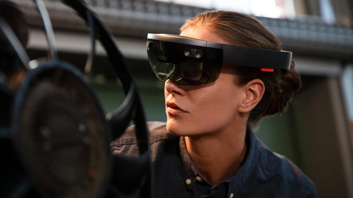 a-female-professional-working--in-a-factory-wearing-hololens-ar-glasses-16375767ee53e1213eb8696b8f485a3983a45a