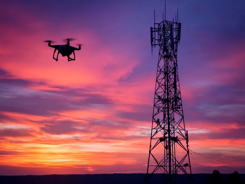 5G cell tower and drone — ISAC integrated sensing and communications for defense